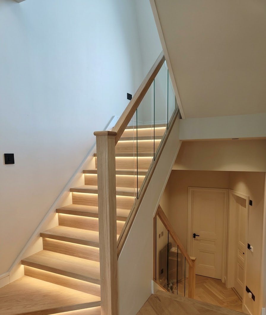 Bespoke oak and glass staircase, part of Zhak & Co.'s Bromley rear extension project